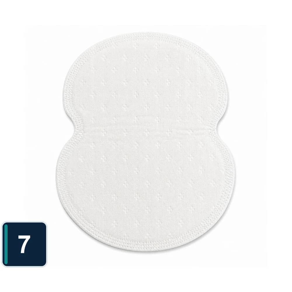 White BESARME hourglass-shaped underarm pad viewed from above.